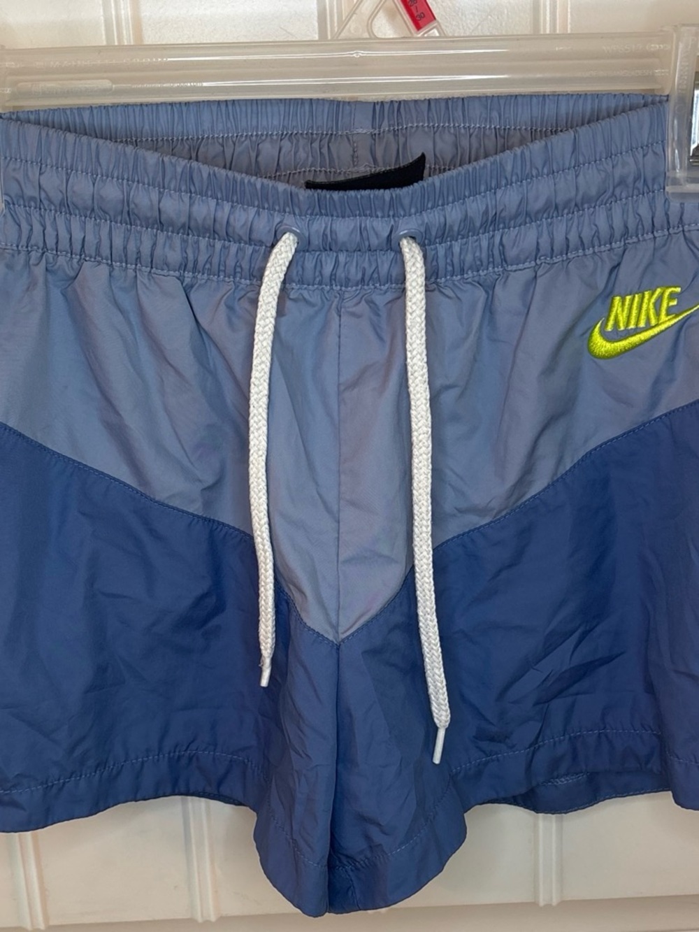 Nike Blue Two-Tone Athletic Shorts with Neon Yellow Logo - Picture 1 of 3